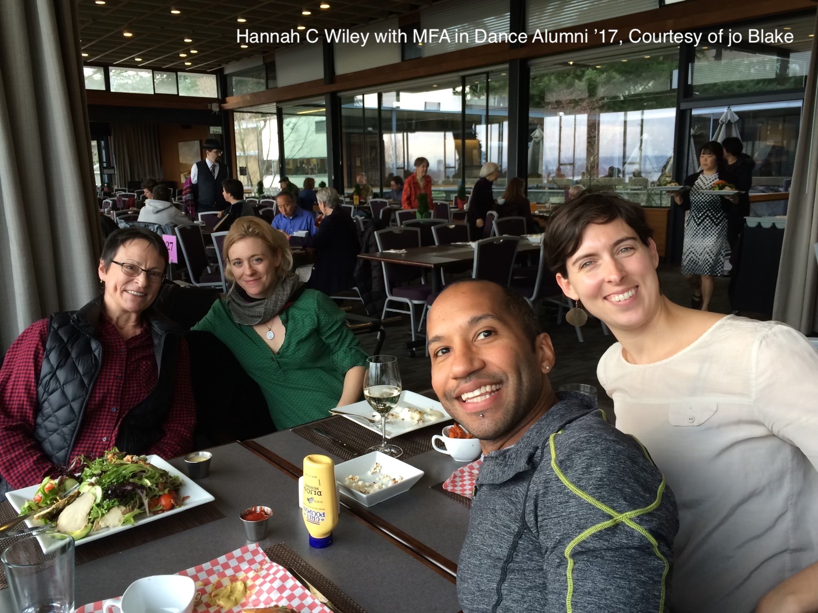 Hannah C Wiley at lunch with MFA program alumni 
