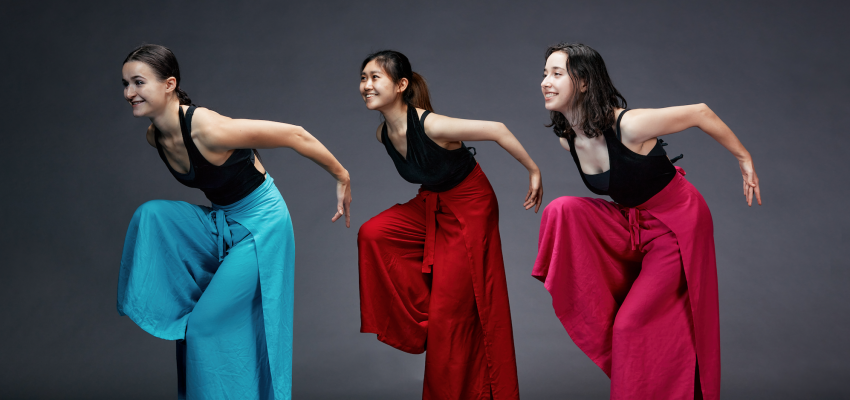 3 dancers in colorful pants 