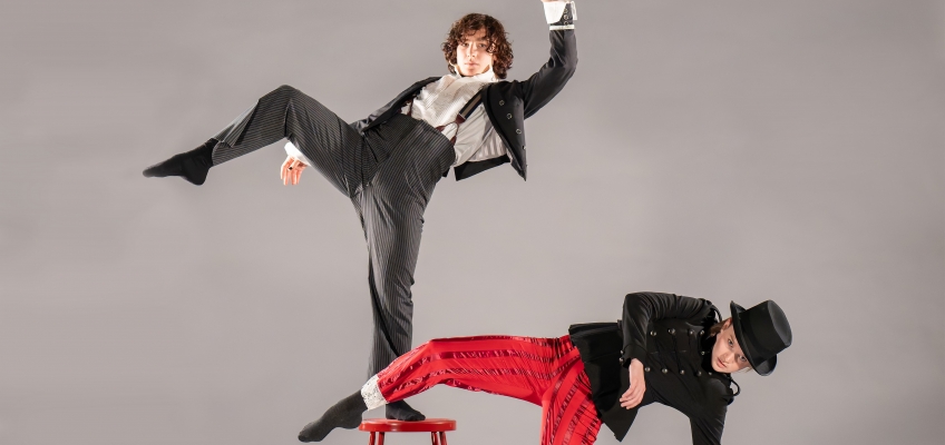 Eddie and Kate dance with a stool 