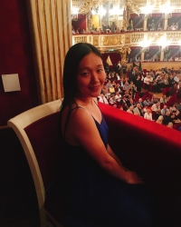 Emily Koya sitting at the opera