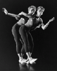 two dancers bent at the hip 
