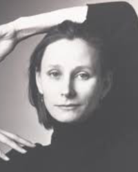 susan Marshall with her arm on her head