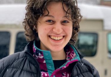 Raquel smiles in the snow 
