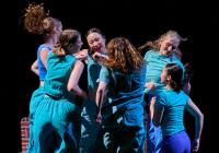 Dancers jumping in a group 
