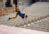 Roel Seeber hangs sideways from the ceiling in a harness.