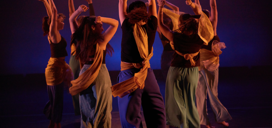 Dancers on stage facing upstage