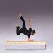 Wilson balances on his forearm on a bench defying gravity 
